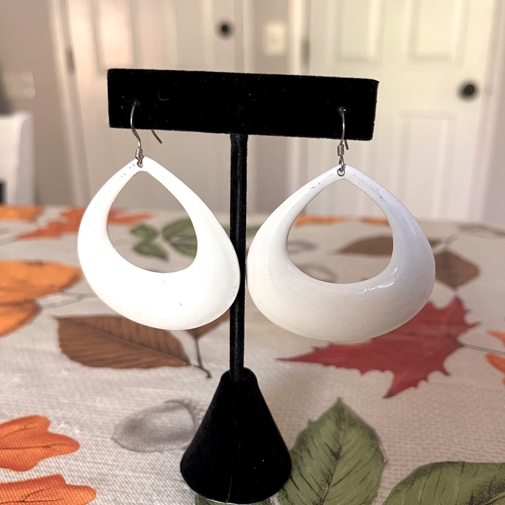 Pretty white metal earrings